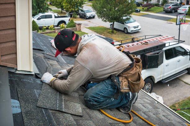 Professional Storm Damage Roof Repair technician working in Springtown, TX